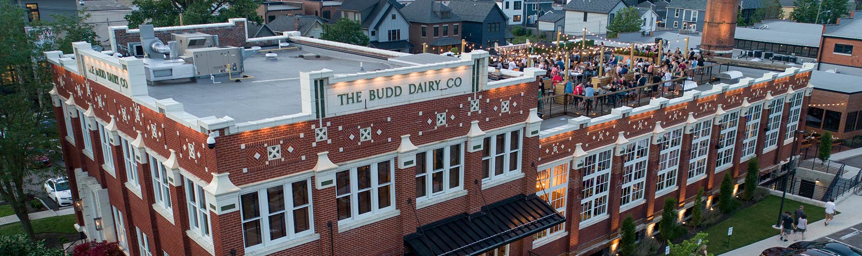 Aerial view of Budd Dairy Food Hall with crowd on roof